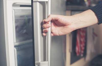 Hand Opening Fridge Door | Refrigeration Service Nassau County